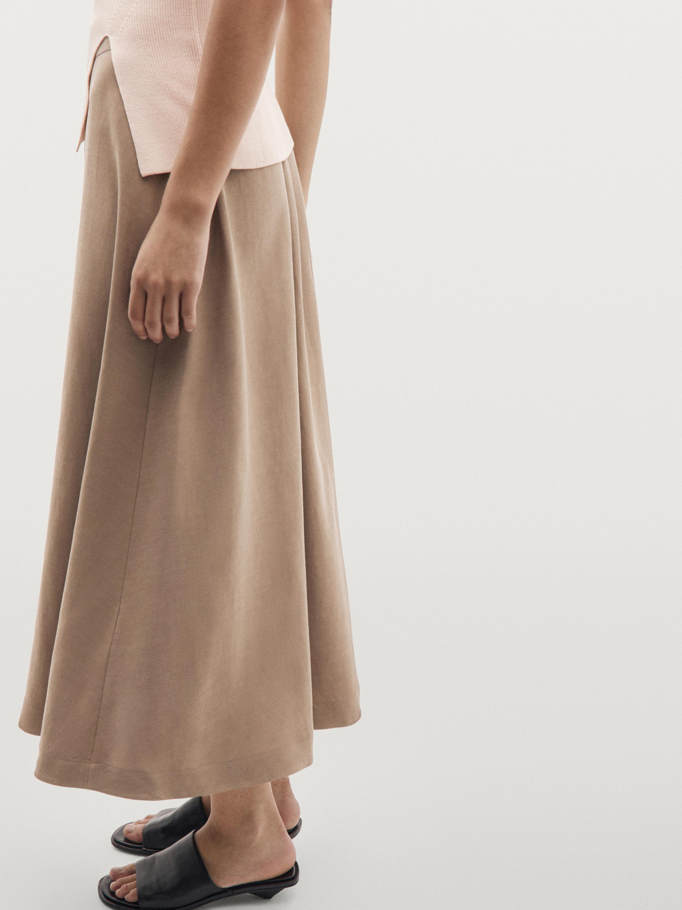 Jupe midi évasée à taille élastique